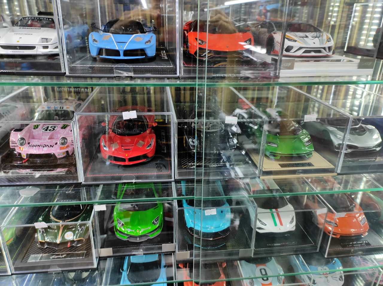 A group of 1/18 scale model supercars