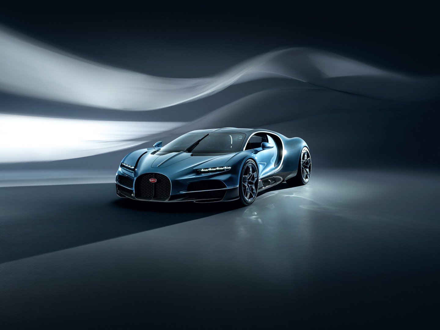 A light blue Bugatti Tourbillon in a dark background