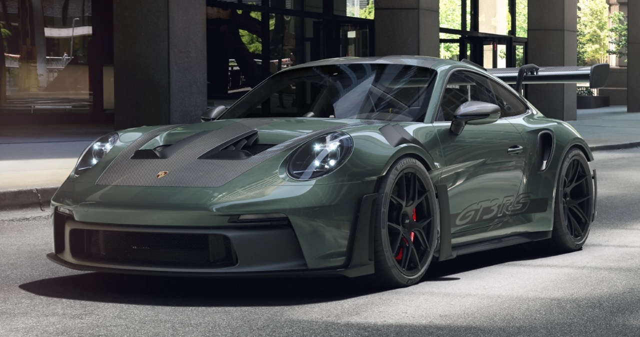 A dark green and black Porsche 911 GT3 RS