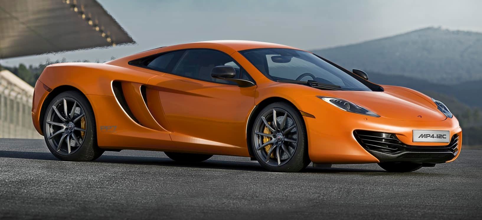 an orange McLaren 12c