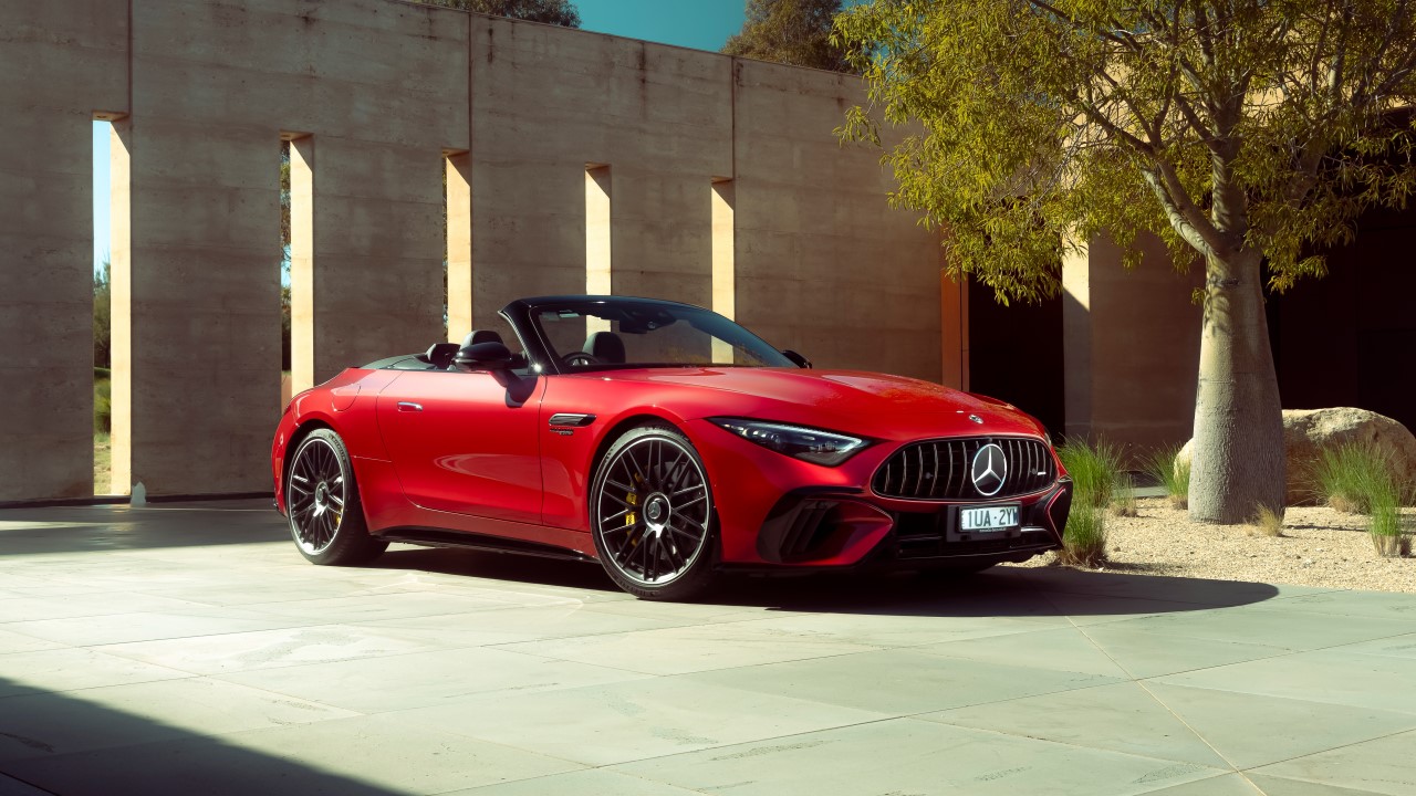 a red Mercedes SL63 AMG convertible