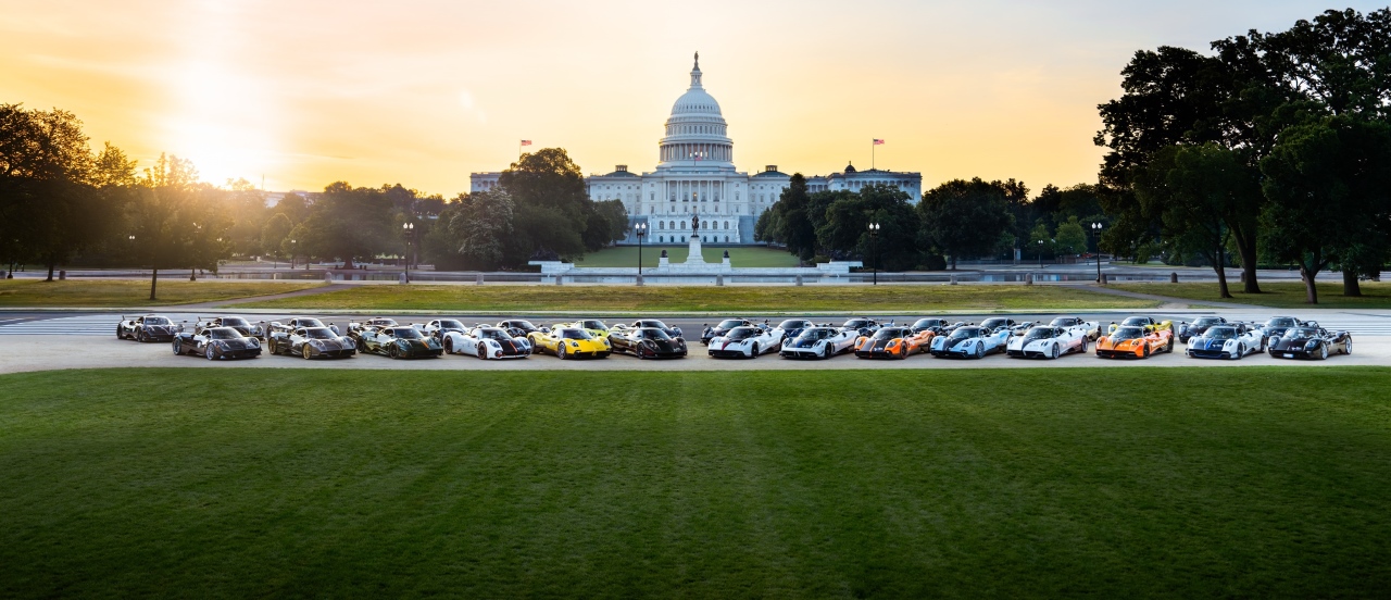 a group of Paganis in Washington DC near lawns with the Capitol Hill behind during sunrise