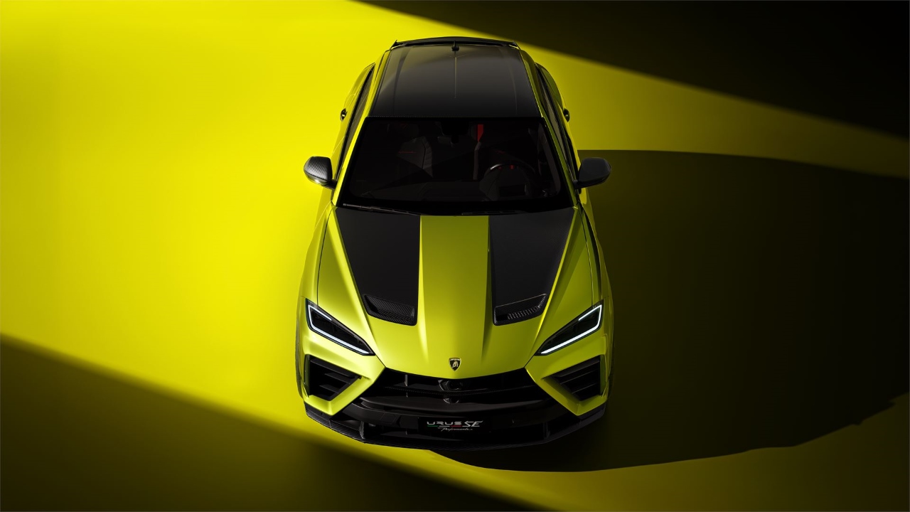an aerial angle of a yellow Lamborghini Urus SE Performante