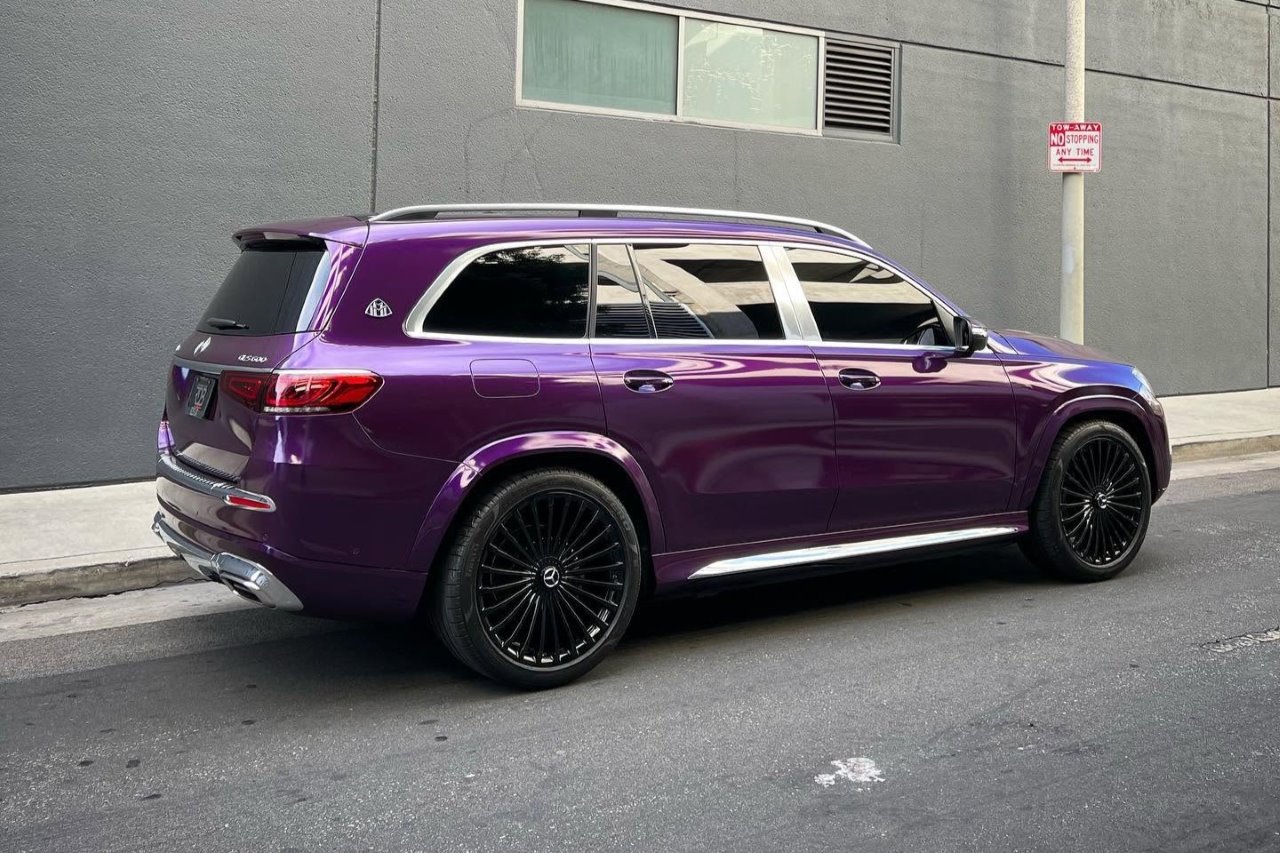 a rear right view of a purple Mercedes Maybach GLS 600 SUV